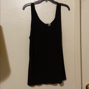 Dark brown sleeveless shirt.